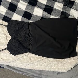 Black homecoming dress with slight slit in the front